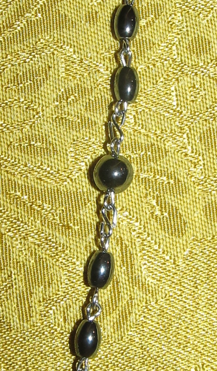 First Communion Hematite Rosary Our Father Detail