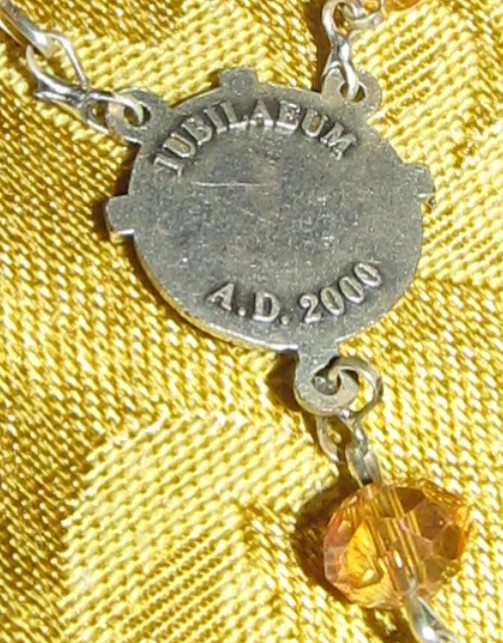 Golden Jubilee Rosary center reverse detail
