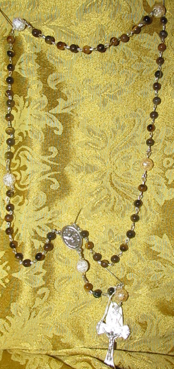 Tiger Eye Glass Rosary displayed