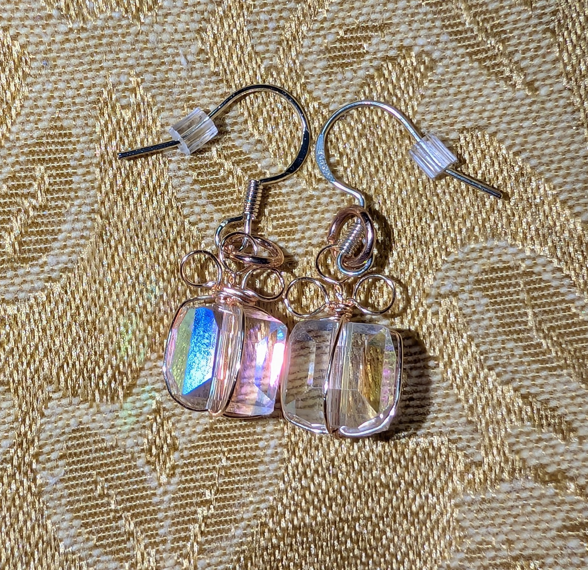 Present earrings in iridescent glass